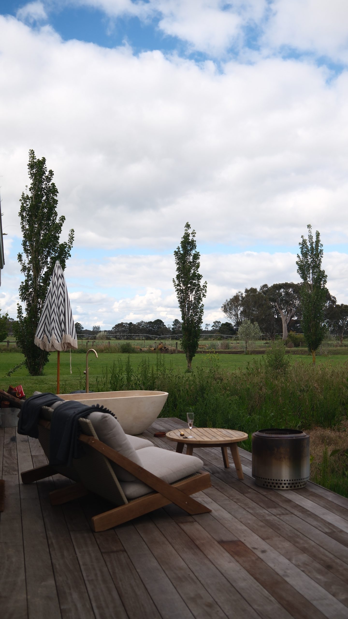 Tiny riverside cabin with outdoor deck and bathtub in Maffra Gippsland countryside
