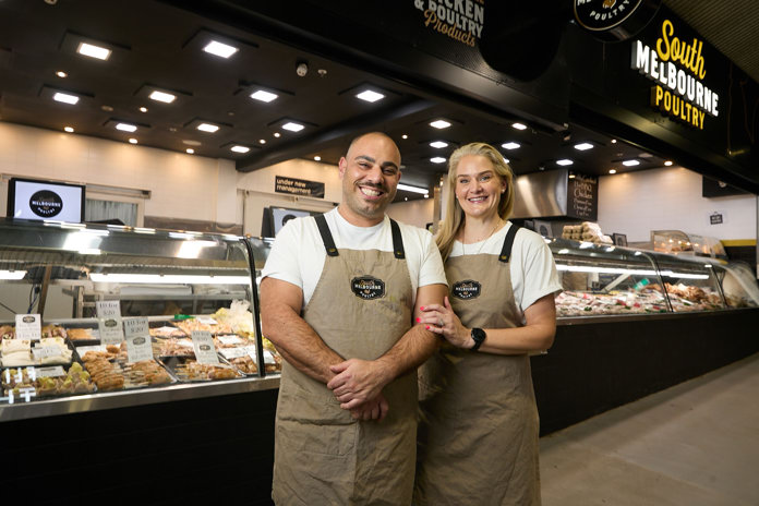 Two friendly staff standing in front of South Melbourne Poultry
