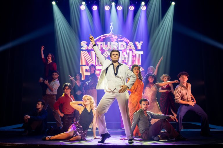 Saturday Night Fever cast on stage at Athenaeum Theatre Melbourne 2026