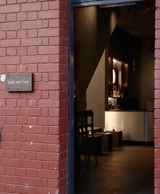 Discreet entrance to One or Two hidden bars in Chinatown, Melbourne, known for minimalist Japanese-inspired cocktails.