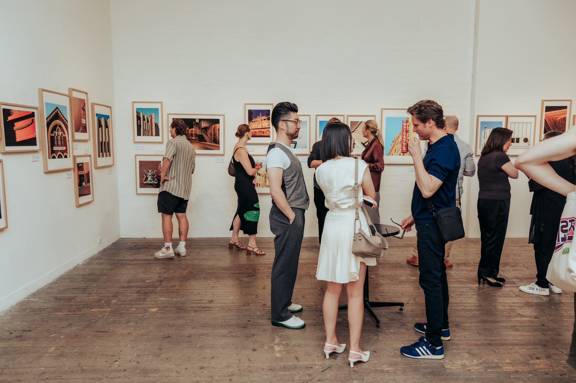 Cameron Grant’s Australian Theatres Unveiled exhibition at fortyfivedownstairs Melbourne, featuring vivid fine-art prints of Australian theatre facades.