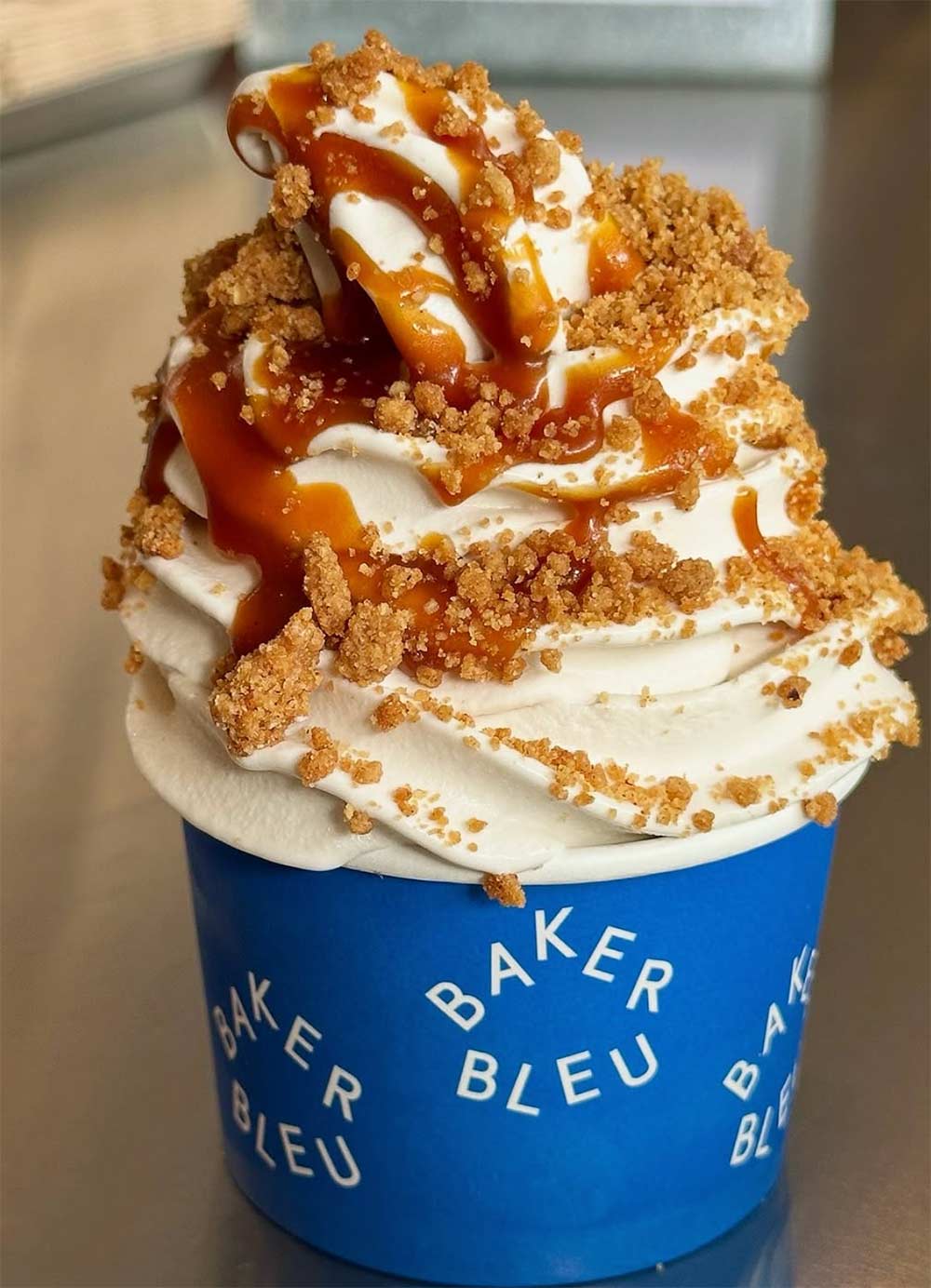 Baker Bleu hot cross bun soft serve with caramel sauce and spiced crumble topping Melbourne Easter 2026