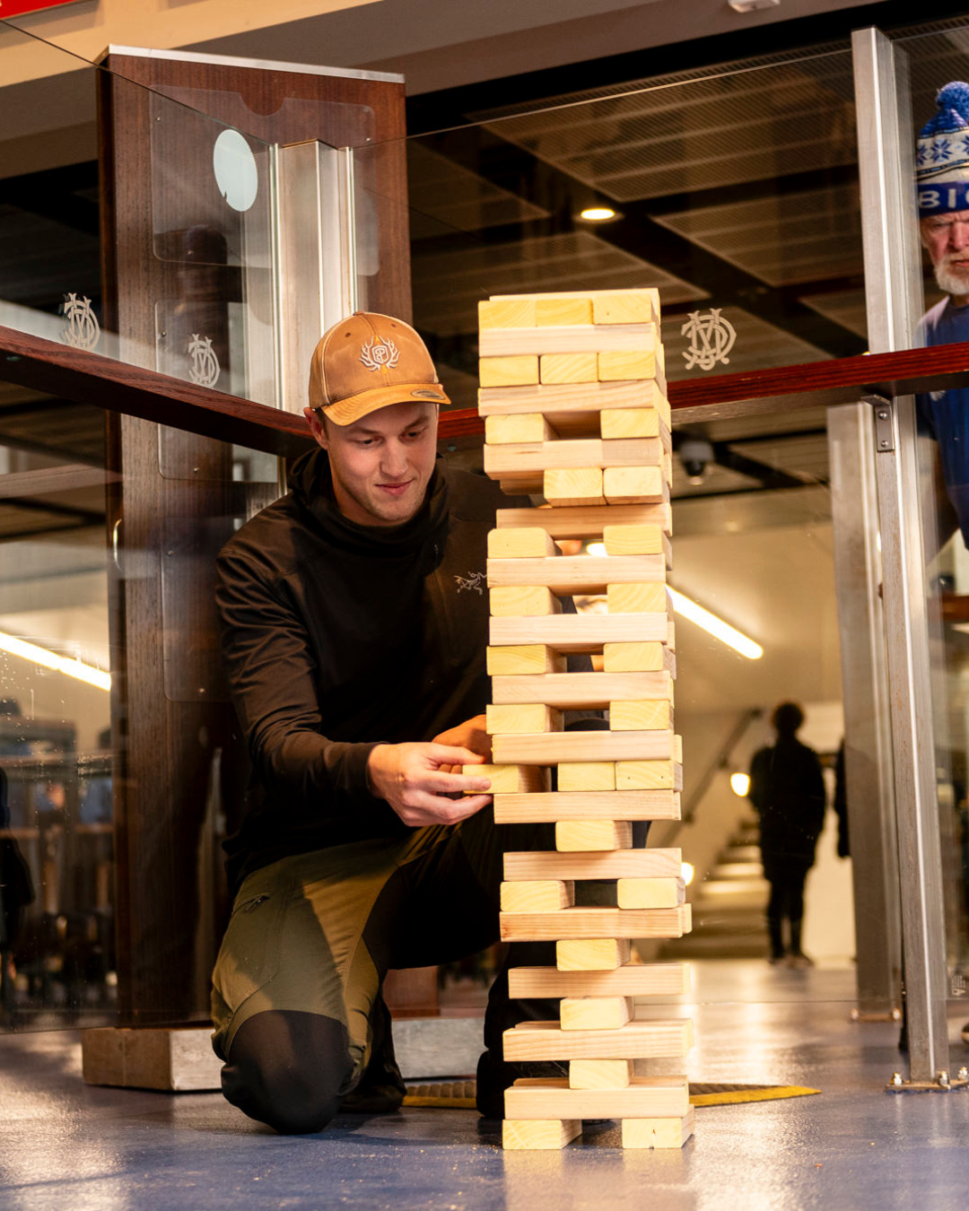 Sleep at the G 2026 participant playing giant Jenga inside the Melbourne Cricket Ground during the MCM youth homelessness fundraiser overnight event