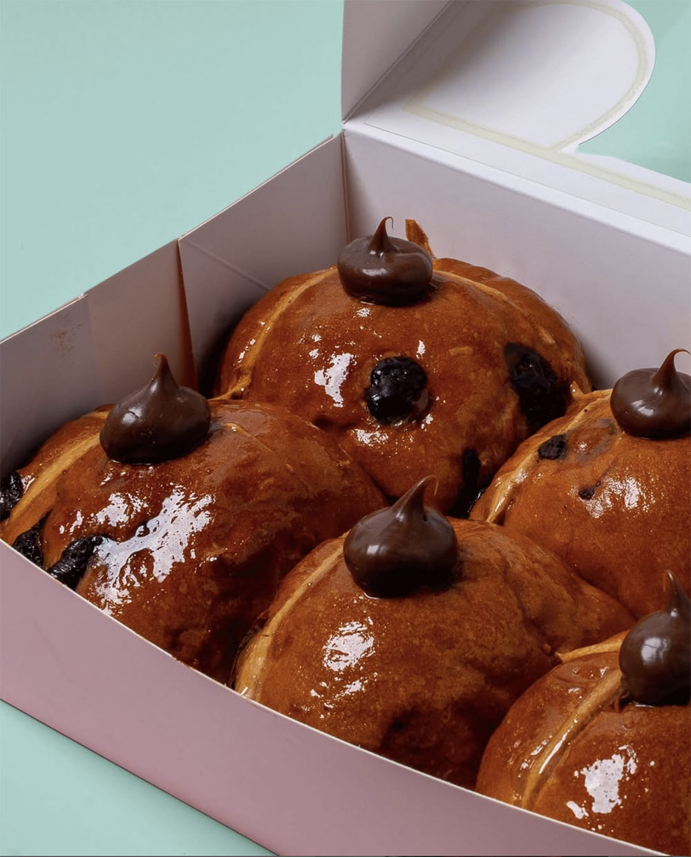 Penny for Pound Axil Coffee mocha cross bun Melbourne Easter 2026 with dark chocolate ganache