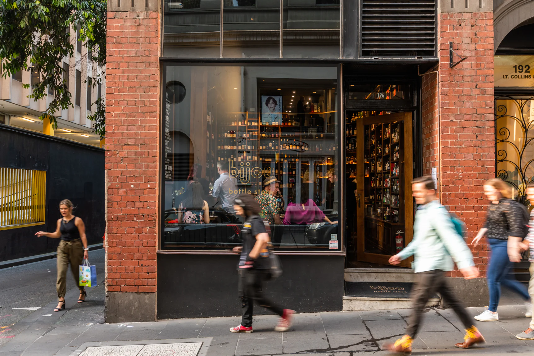 Bijou wine bar warm timber booths Melbourne CBD