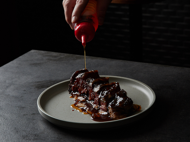 Charcoal steak Melbourne — glazed beef short rib with sauce at Meat Maiden Melbourne