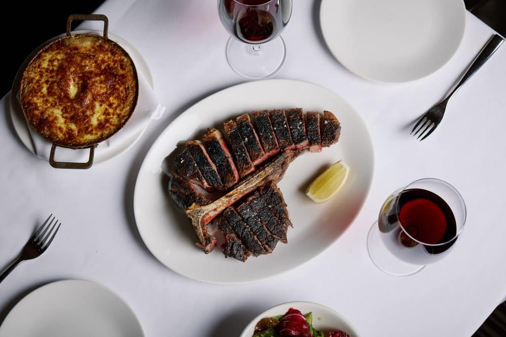 Wood fired steak Melbourne CBD — dry aged charcoal T-bone at Rockpool Bar & Grill Melbourne