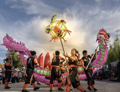 Dragon dance cultural performance at Hawker 88 Night Market Queen Victoria Market Melbourne
