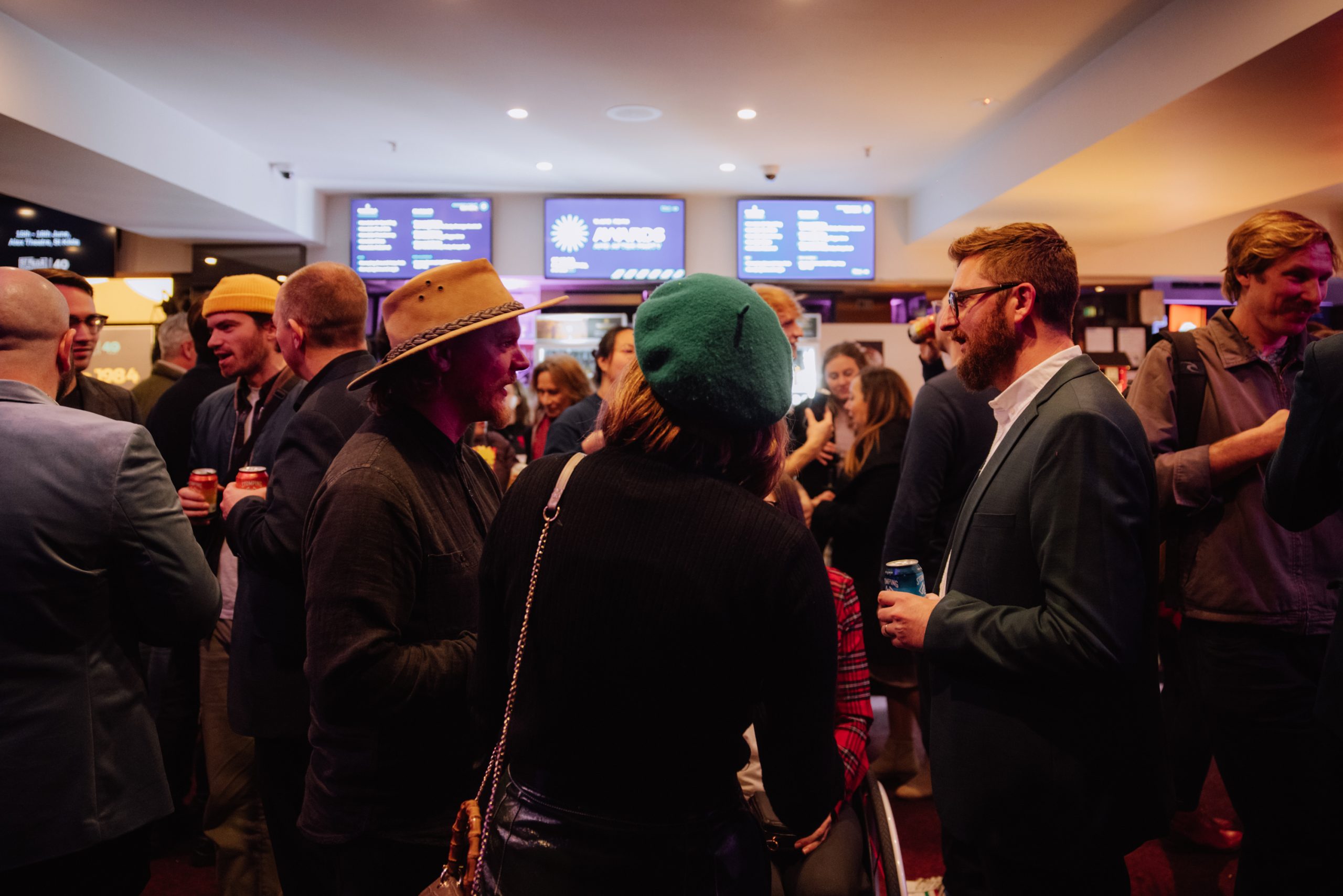 Filmmakers and guests networking at St Kilda Film Festival awards night foyer Melbourne