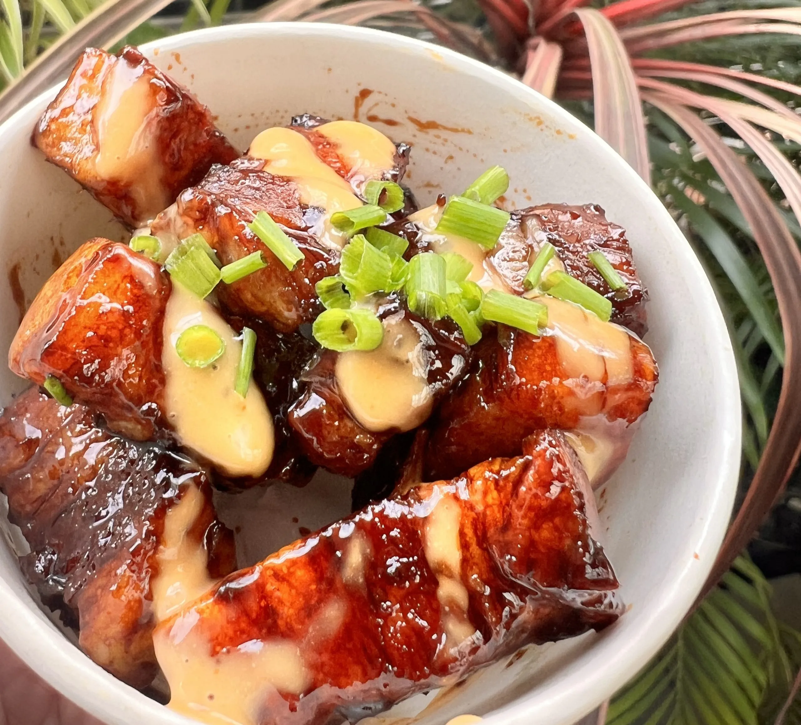 Dragon Joe's caramelised hoisin pork belly bites with spring onion $8.80 at Hawker 88 Night Market Melbourne
