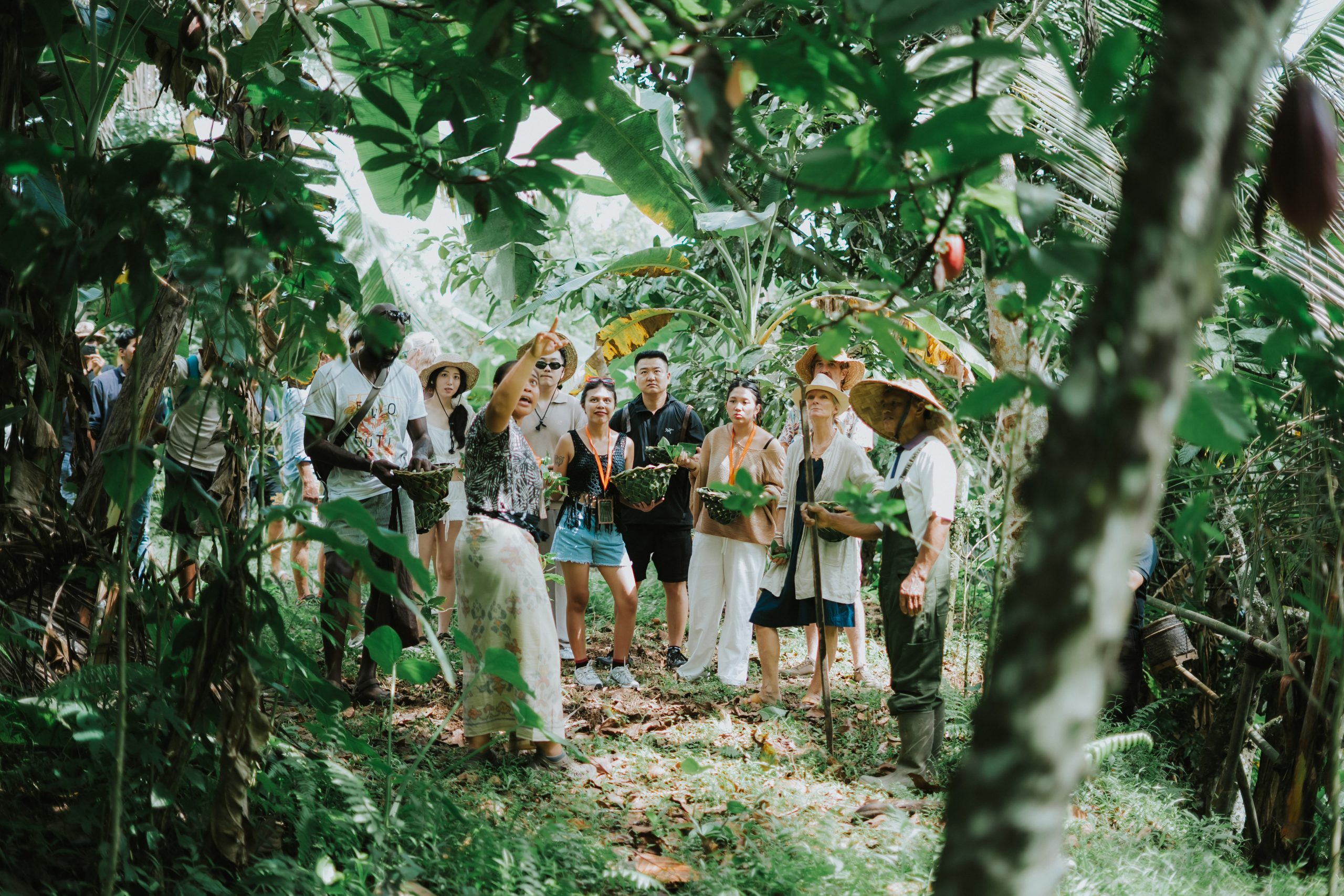 Group foraging wild ingredients during Ubud Food Festival 2026 immersive food tour through Balinese jungle Ubud Bali