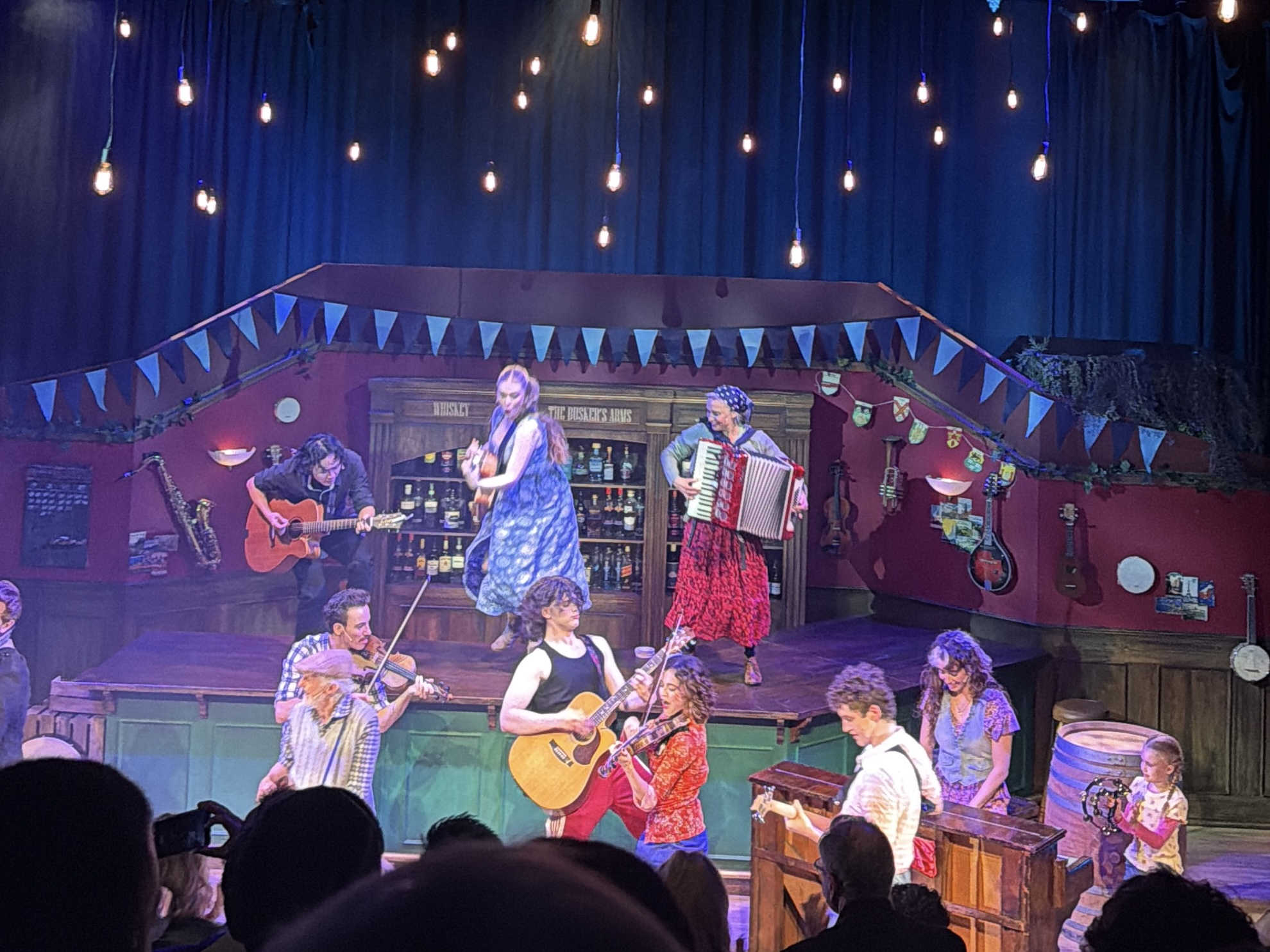 Cast performing an Irish céili dance scene in Once the Musical Melbourne 2026 at Chapel off Chapel, with live musicians on stage