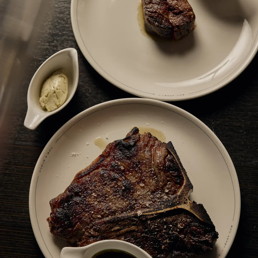 Wood fired steak Melbourne — T-bone and eye fillet with compound butter at Angus & Bon